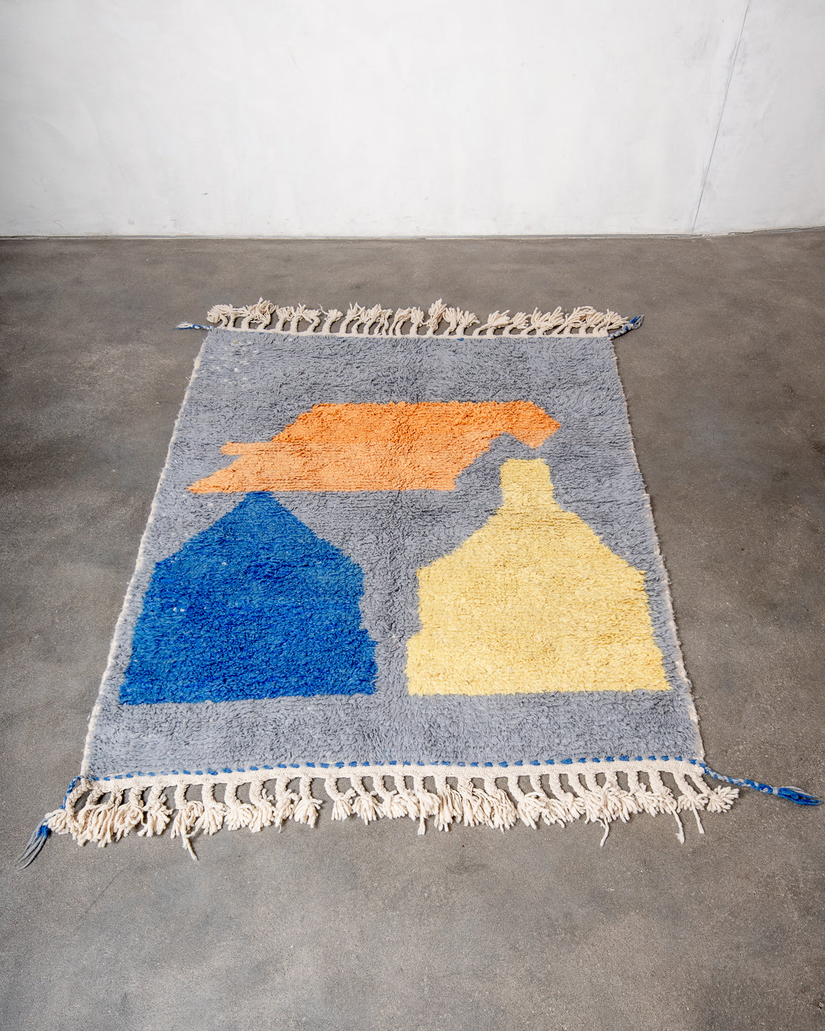 Modern, designer, handcrafted Berber rug from Morocco. Beniourain carpet with beautiful colours and patterns and fluffy wool texture.